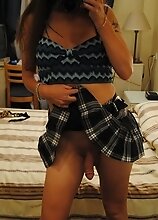 Nikki's mini skirt could barely contain the beast of a dick she's hiding underneath